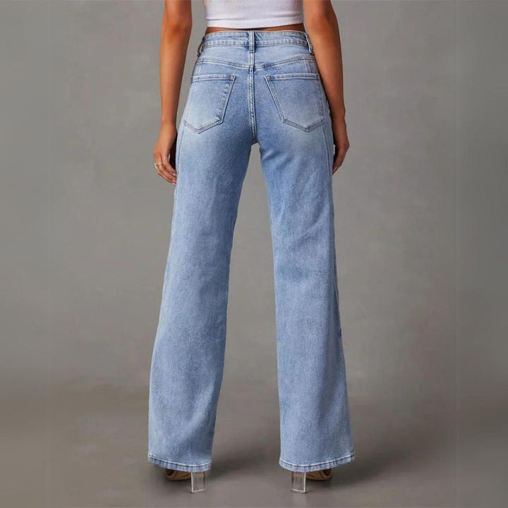 High-Waisted Flared Jeans | V-Seam Detail | Light Wash Denim