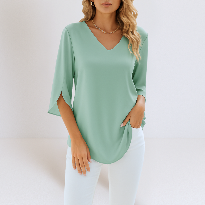Rialta - Elegant V-neck blouse with slit sleeves