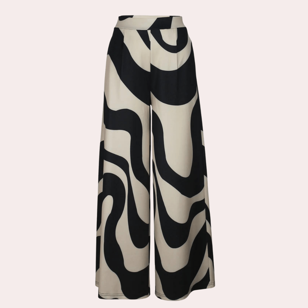 High-Waisted Maxi Skirt | Bold Abstract Print | Flowing Silhouette | Statement Piece