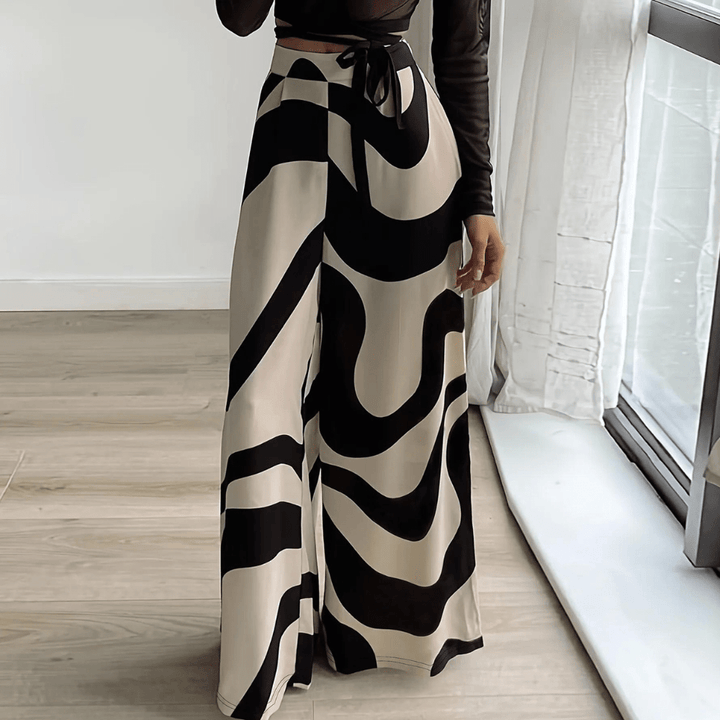 High-Waisted Maxi Skirt | Bold Abstract Print | Flowing Silhouette | Statement Piece