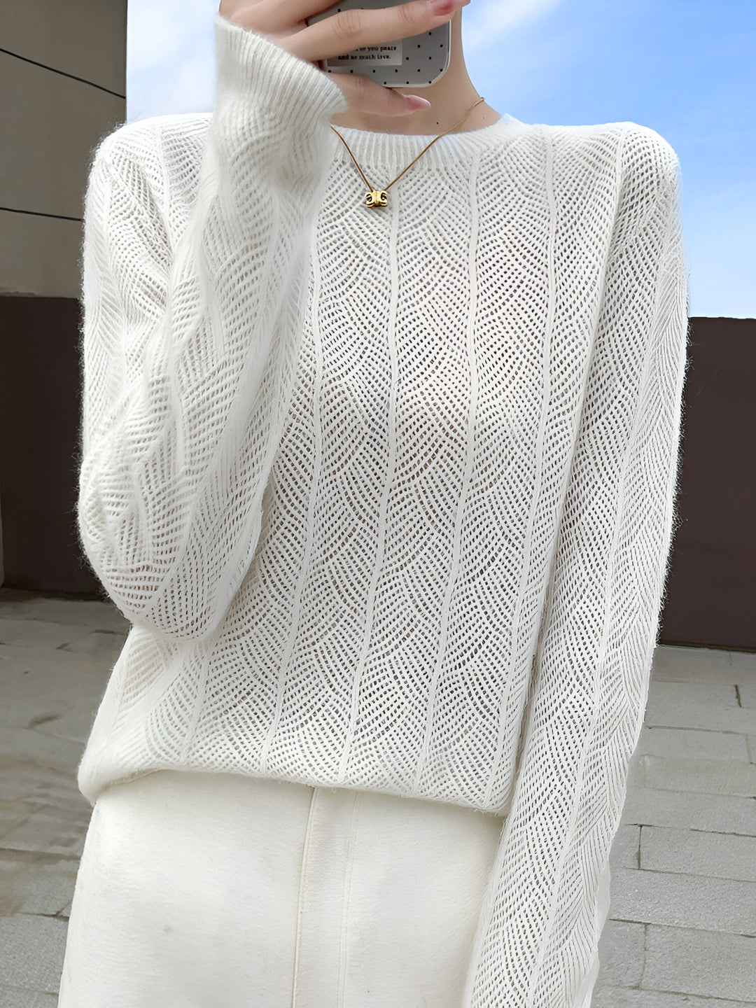 Mika - Merino wool sweater with elegant cutouts