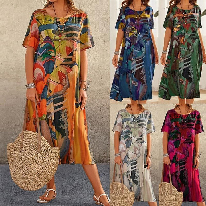 Nyelisse - Flowing dress in bright tropical colors