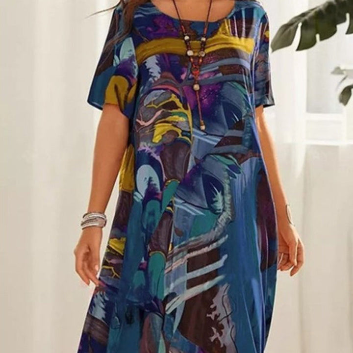 Nyelisse - Flowing dress in bright tropical colors